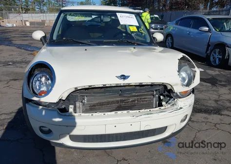 2010 Mini Cooper z USA, uszkodzony, nr VIN WMWMF3C56ATZ65306